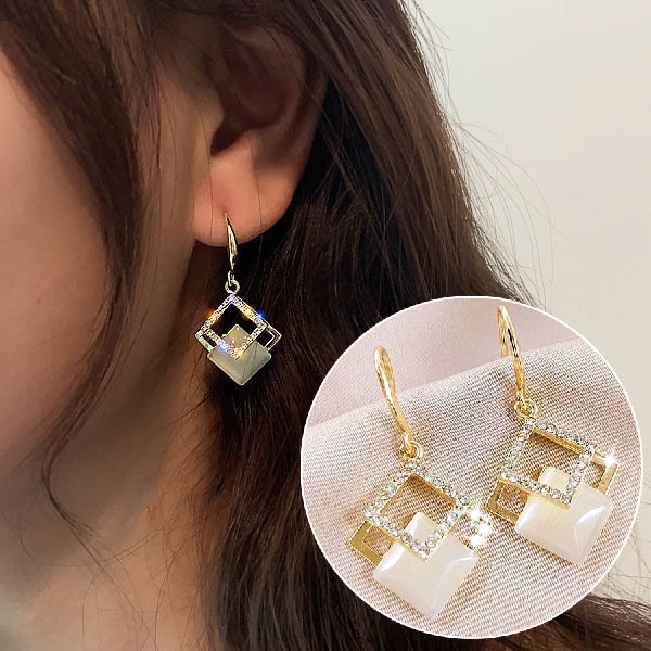 Сережки позолочені з кристалами №14084 